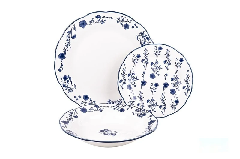 Irregular Glazed Porcelain dinnerware Set with Blue Floral Detail, 18 pc. Designed for: Everyday use and Special Occasions.