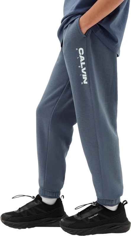 Calvin Klein Boy's Ck Graphic Relaxed Sweatpant LVCKTJC44B Sweatpants, Blue (Nightshadow Blue), 14 Years
