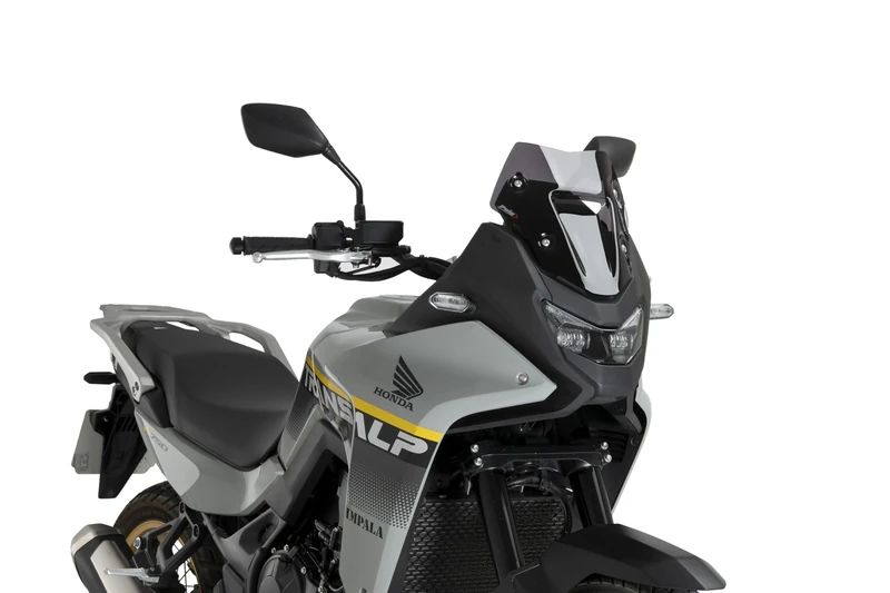 Puig 22572F Dark Smoked Cúpula Sport compact aerodynamic windscreen made in high impact PMMA designed to improve wind protection, riding comfort and sporty appearance on the motorcycle