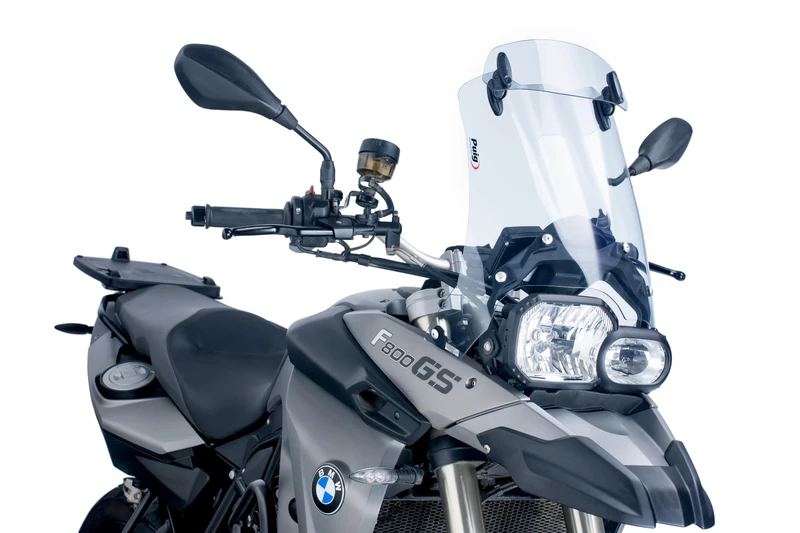 Puig 5914W Touring Windscreen with Transparent Visor designed to improve aerodynamics, increase wind protection and offer greater comfort and stability during riding on all types of journeys