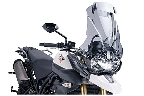 Puig 5918W Touring Windscreen with Transparent Visor designed to optimize aerodynamics, improve wind protection and offer greater comfort and stability on all types of routes and riding conditions
